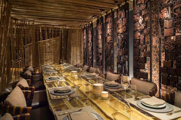 Semi-private-dining-room-with-antique-batik-tjap-wall-feature