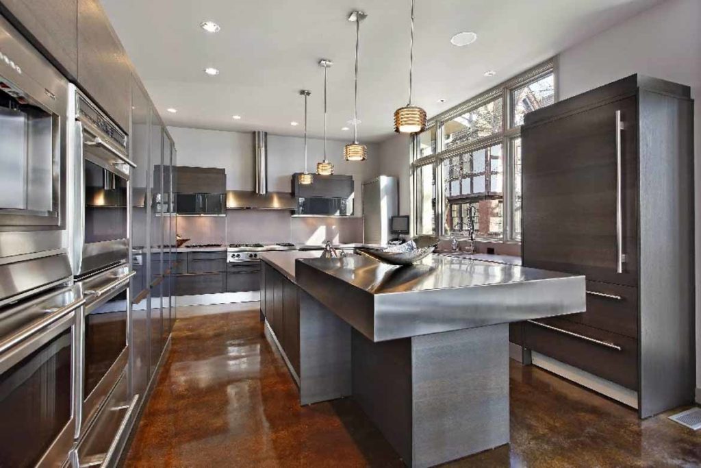 stainless steel kitchen island and bench with matching cabinets