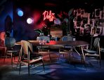 aturday-Indeisgn_Commune-Volta-dining-table-in-luxurious-black-leather-black-American-walnut-wood-and-brass-trimmings-paired-with-Volta-side-chairs