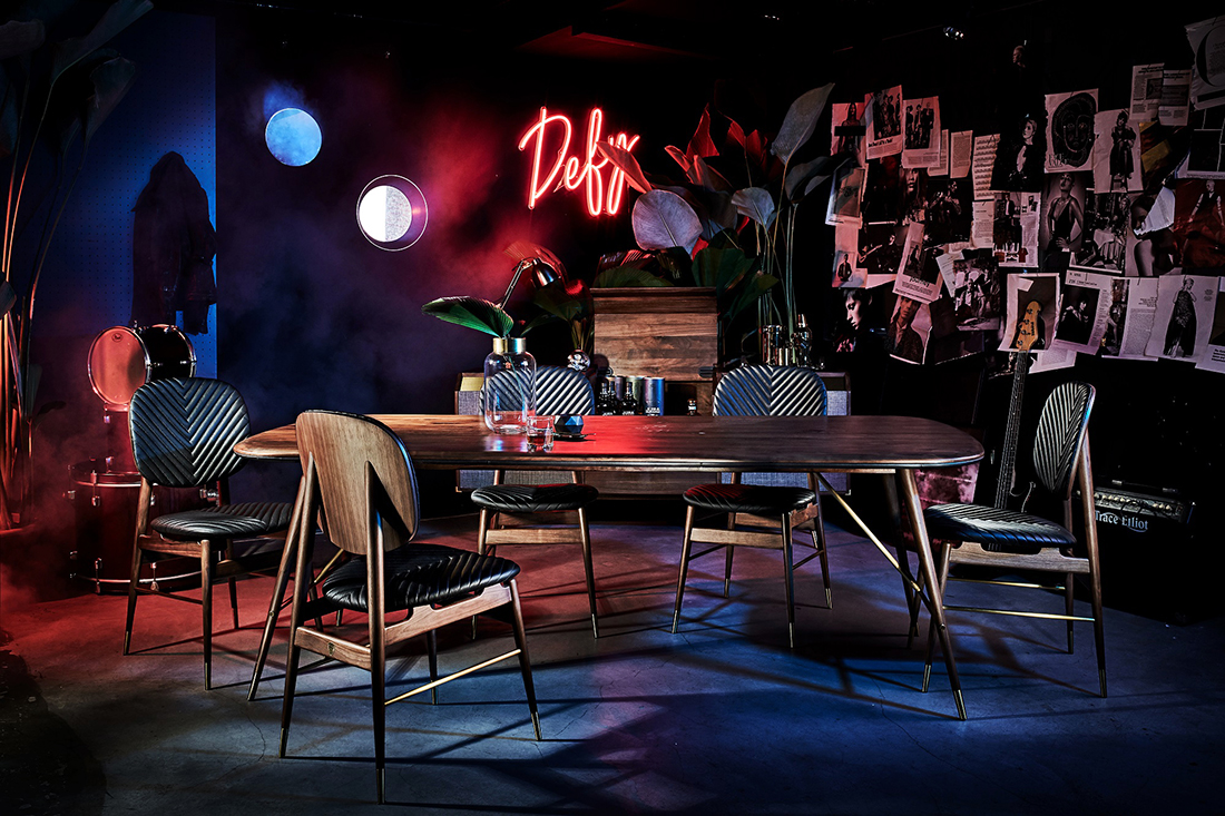 aturday-Indeisgn_Commune-Volta-dining-table-in-luxurious-black-leather-black-American-walnut-wood-and-brass-trimmings-paired-with-Volta-side-chairs