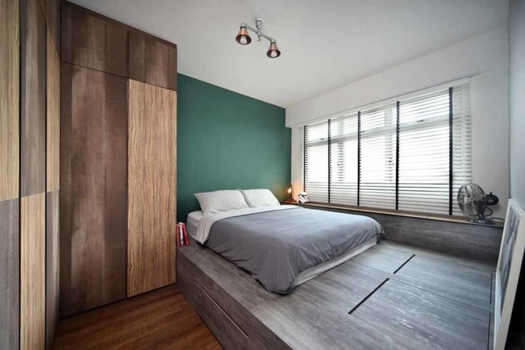 large hdb master bedroom with platform room