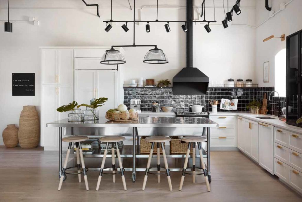 large kitchen with stainless steel bench and backsplash