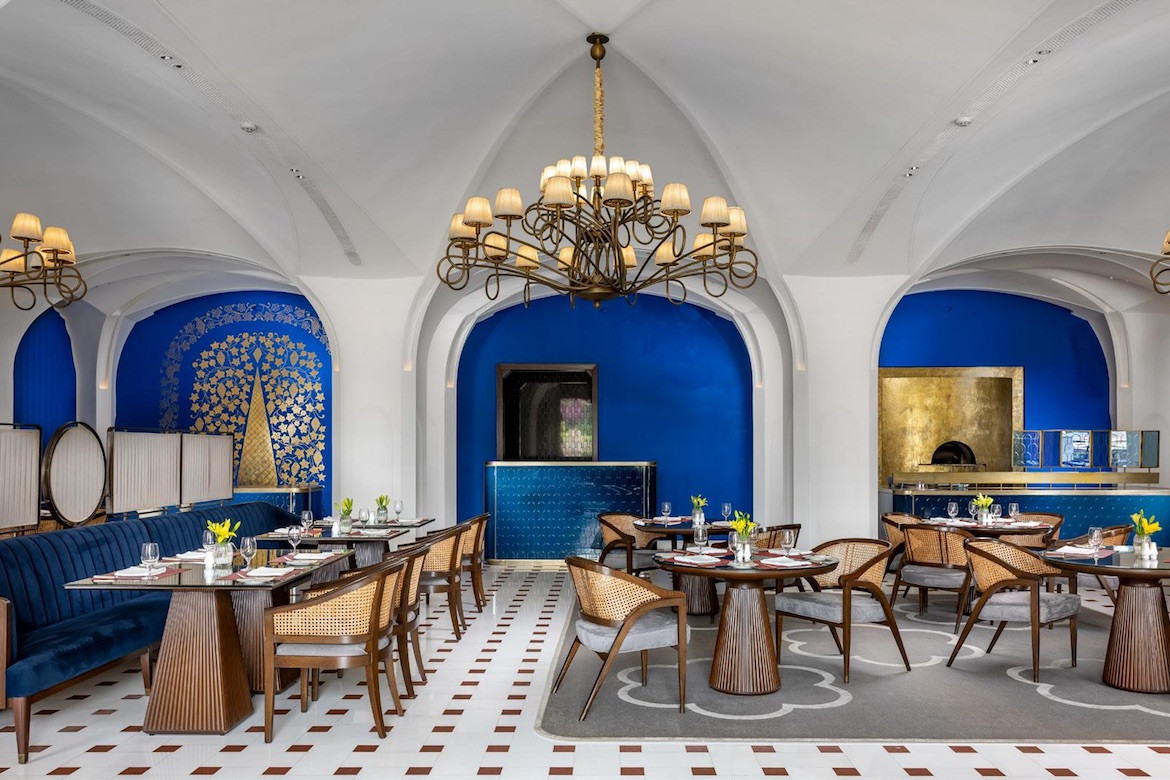 Blue, white and brown interiors at Bellevue at The Oberoi