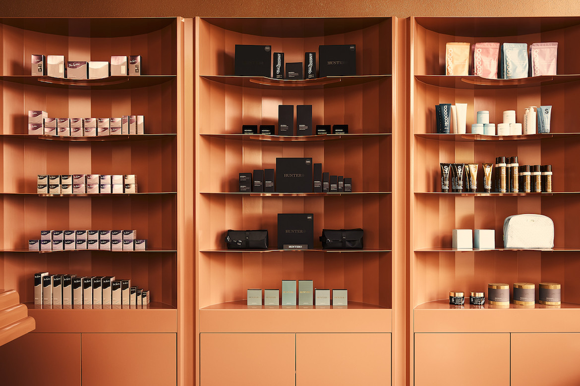 Products on the monochromatic shelves of Beauty Block.