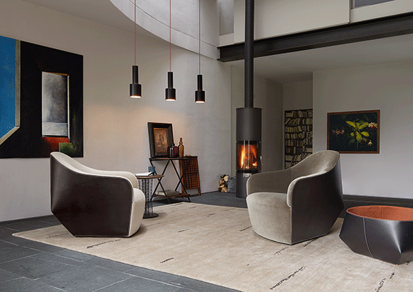 Isanka Chair, designed by EOOS. Distinctive character. Isanka Chair is an invitation you cannot decline. The armchair stands for the values of the Isanka family appreciated by connoisseurs all over the world: a tribute to craftsmanship and material. Striking leather and fine fabrics meet in clean, flowing lines. Perfectly finished with powerful upholstery. Opulent comfort in a new dimension.