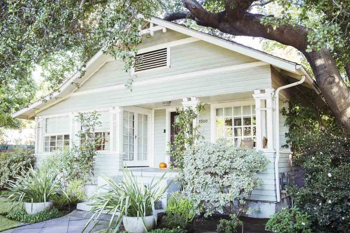 luxury farmhouse facade tall windows high ceiling