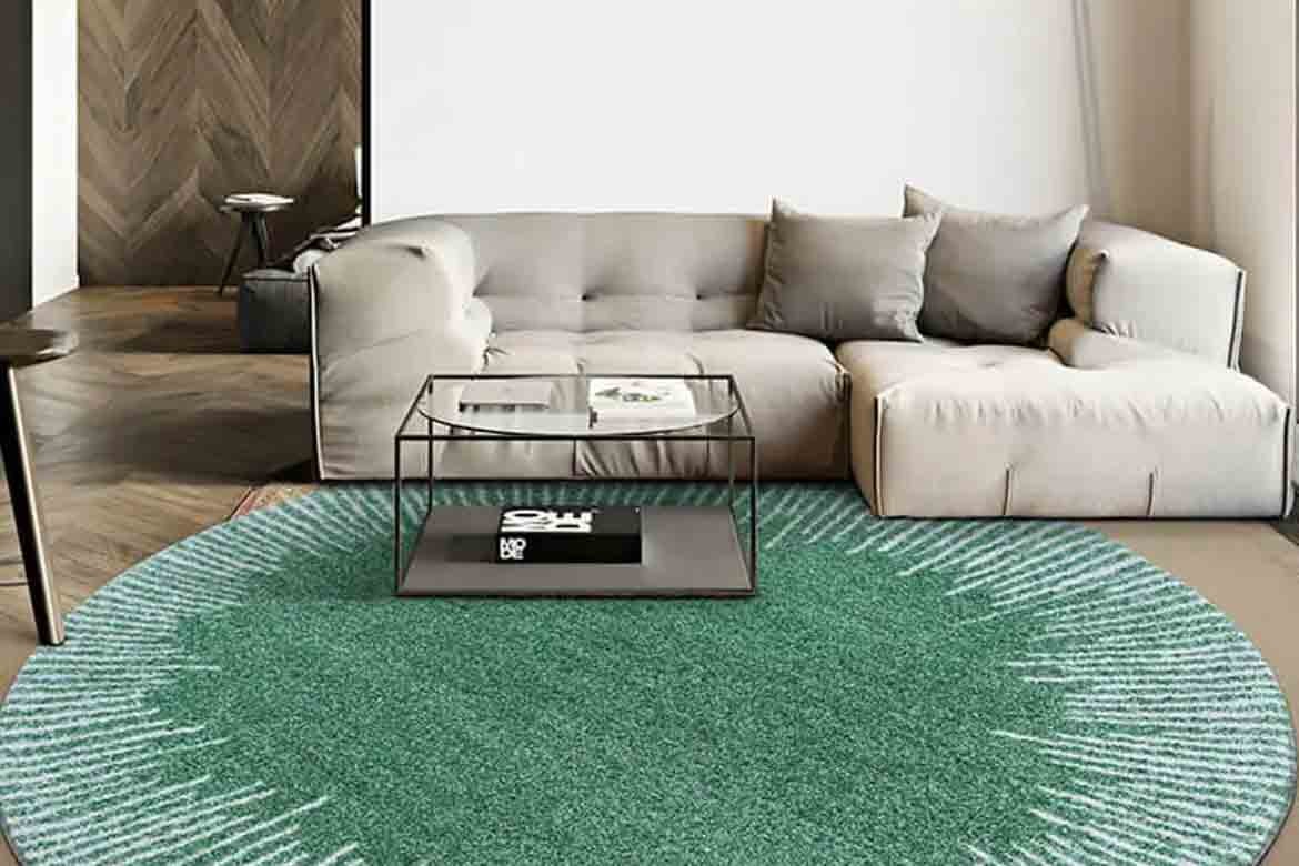 green living room rug with couch and coffee table sun emblem