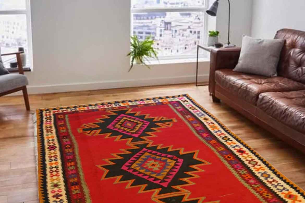 handmade australian rugs persian style red in living room brown couch white walls and plants living room decor