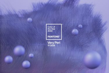 A digitally rendered image of The Pantone Color of the Year Very Peri, displaying periwinkle blue bubbles and hair-like textures.