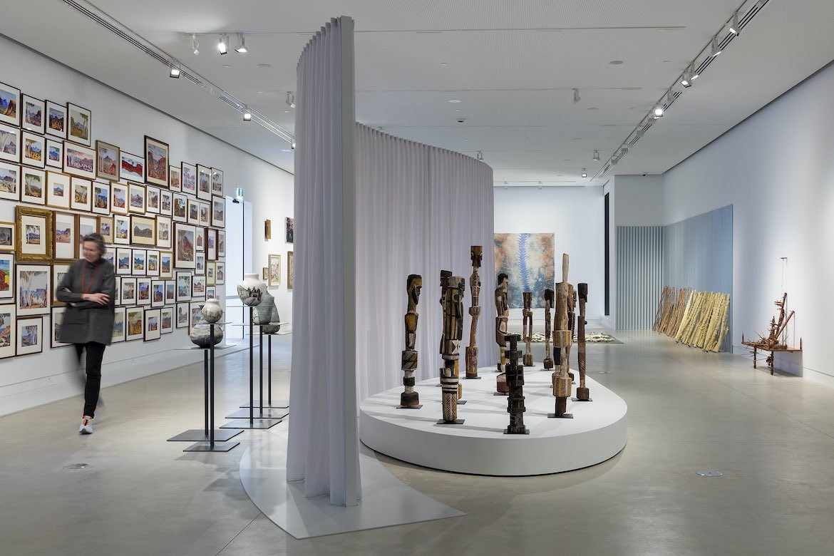 A person walks through an installation in SAM.
