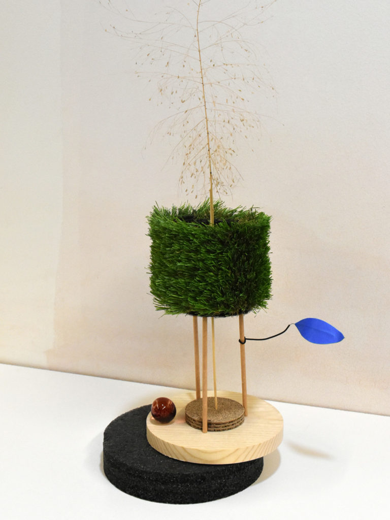 David Kruk’s vase, made from black polyethylene foam, wood, glass, cardboard, 60-grit sandpaper, paper straws, wire, heat shrink tubing, blue tape, bamboo skewer, olefin turf, image courtesy of the artist.