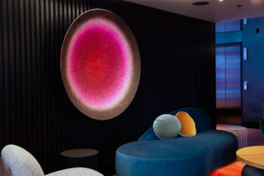 Moonlit art shines through QT’s seascape design