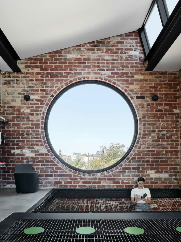 A built-in hammock in Brick House by State of Kin.