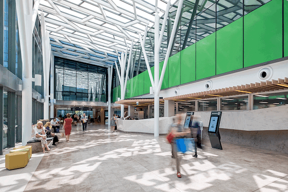 White and green features in a foyer of the Royal Adelaide Hospital by DesignInc.