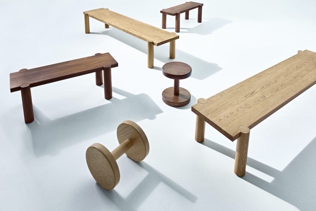 A collection of benches and stools with cylindrical legs by Boris Tošić.