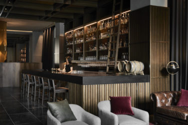 Woods Bagot uses Elton Group Eveneer to add a crafted touch to Next Hotel Melbourne