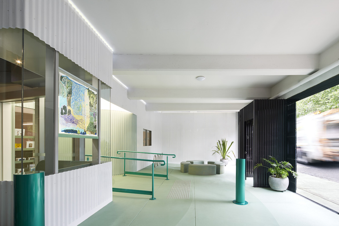 APA's green and white entrance area, designed by Sibling Architects.